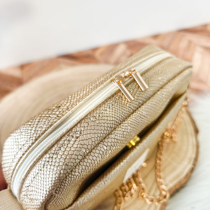 Tessa - Sac bandoulière doré effet serpent