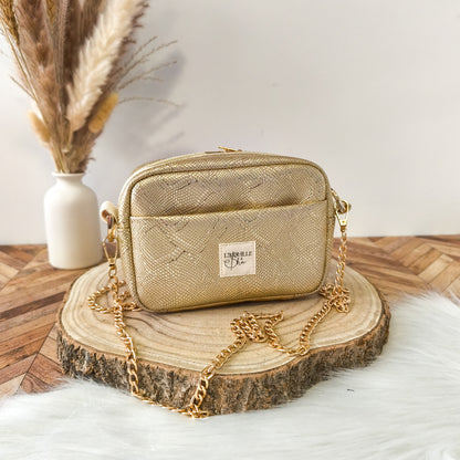 Tessa - Sac bandoulière doré effet serpent